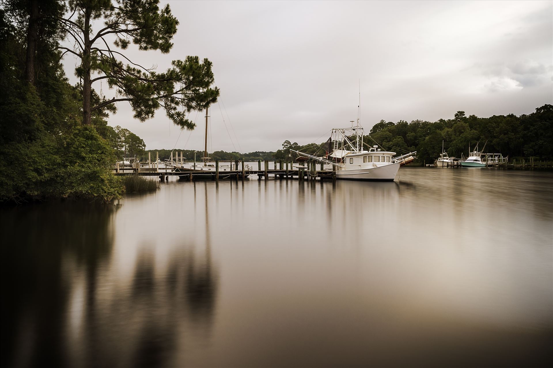 long exposure of boats in the bay 8500344.jpg - Shrimp boat at dock, Southport, Florida by Terry Kelly Photography
