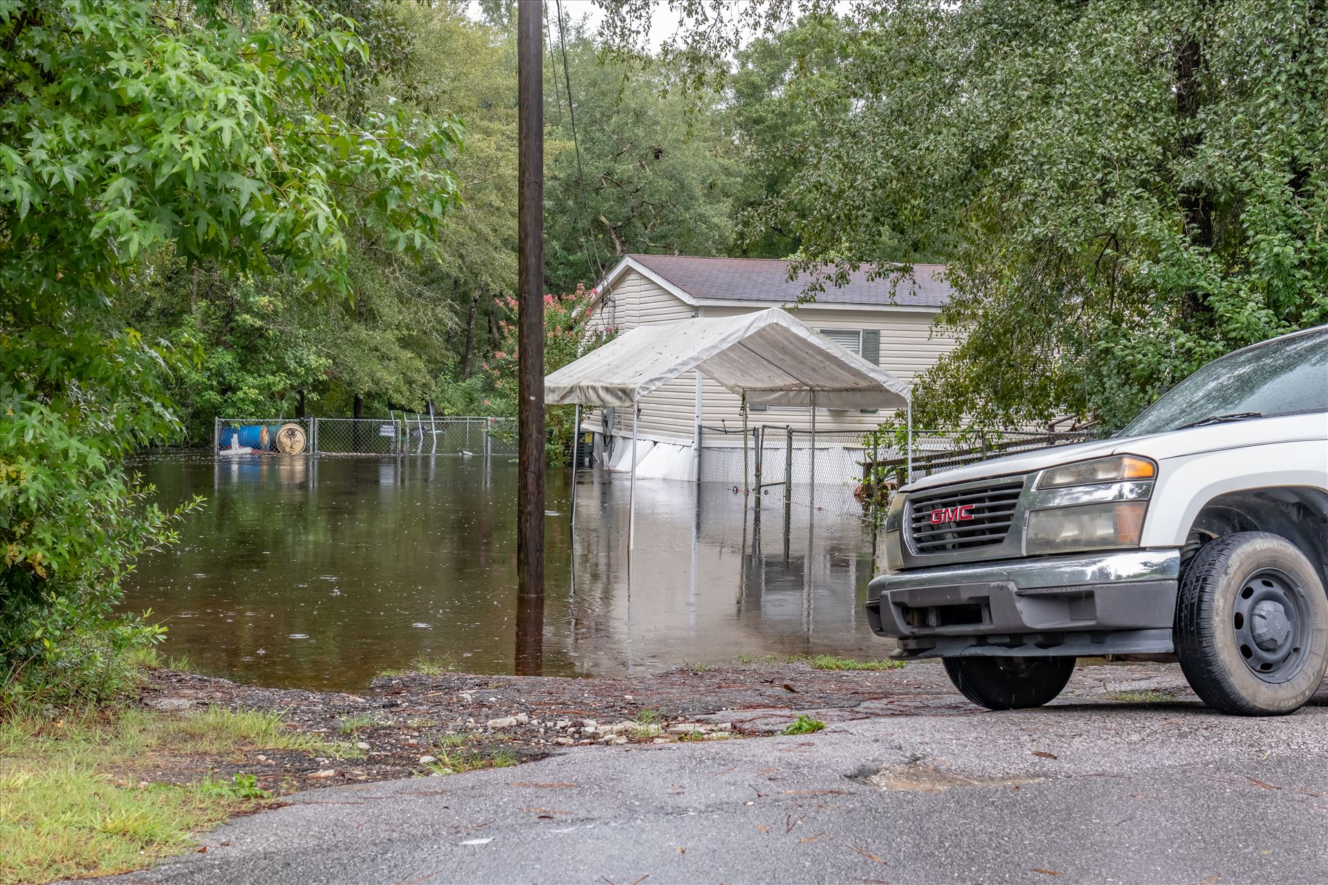 bear creek out of bank 6 August 02, 2018.jpg - August 02, 2018 heavy rains flooded many parts of Bay County, Florida. This photo is in the Bear Creek area. by Terry Kelly Photography