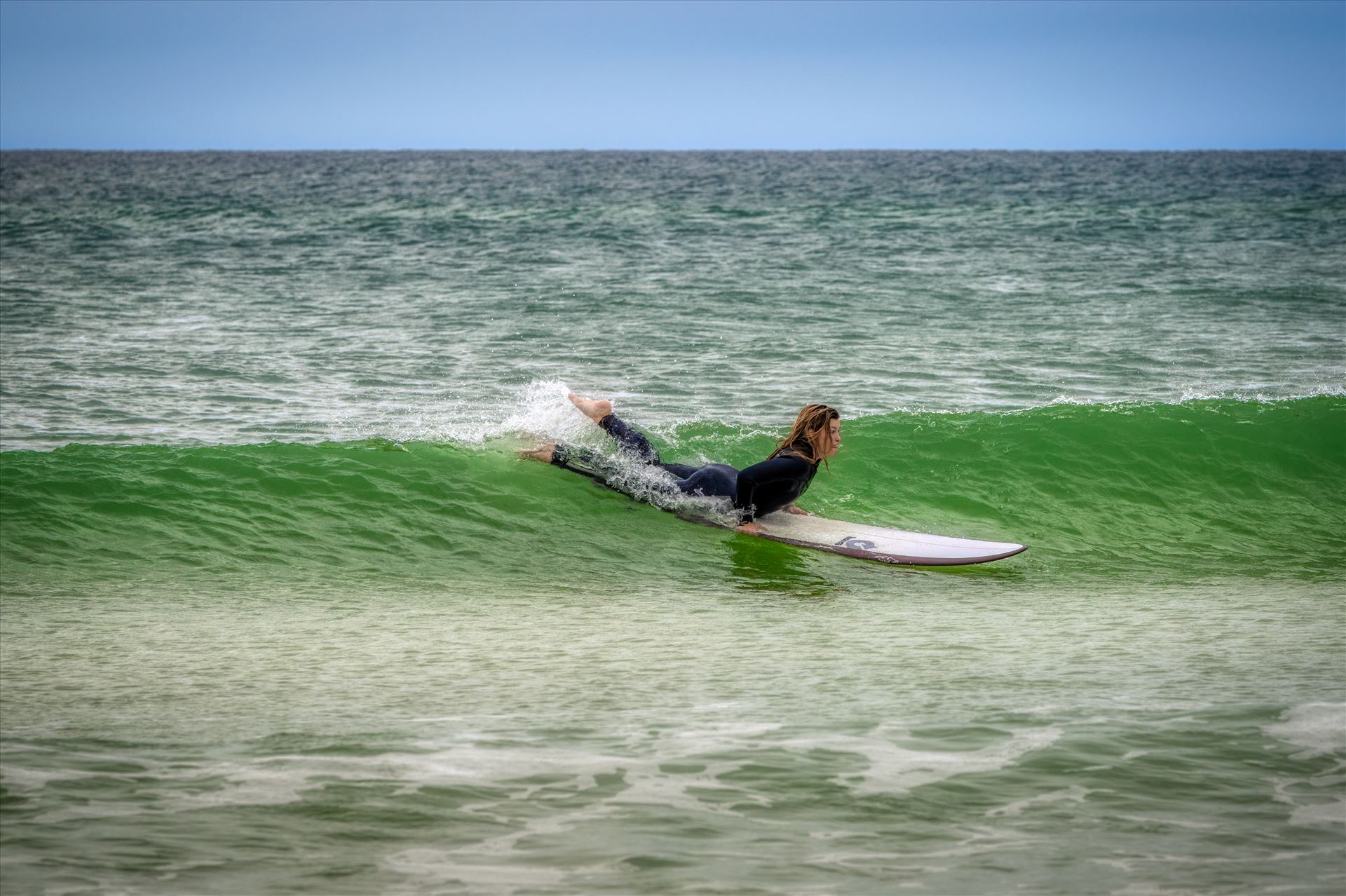 surfer girl - Female surfer at St. Andrews State Park at the jetties by Terry Kelly Photography