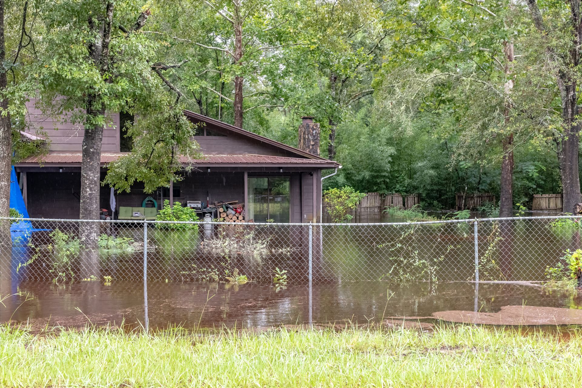 bear creek out of bank 2 August 02, 2018.jpg - August 02, 2018 heavy rains flooded many parts of Bay County, Florida. This photo is in the Bear Creek area. by Terry Kelly Photography