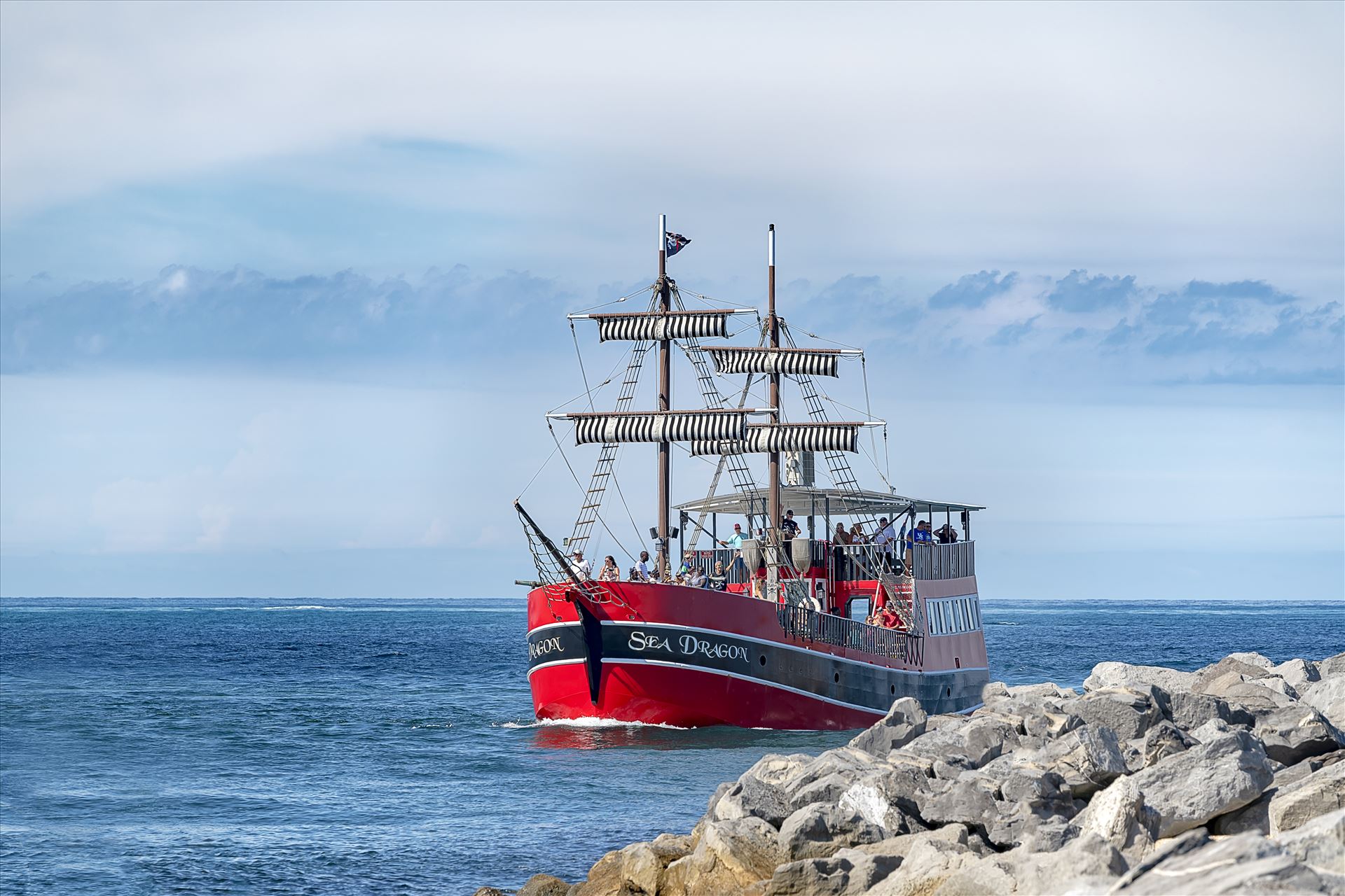 sea dragon pirate ship at the jetties st. andrews state park 8500316.jpg - The Sea Dragon pirate ship coming from the gulf of mexico through the jetties at Panama City, Florida by Terry Kelly Photography