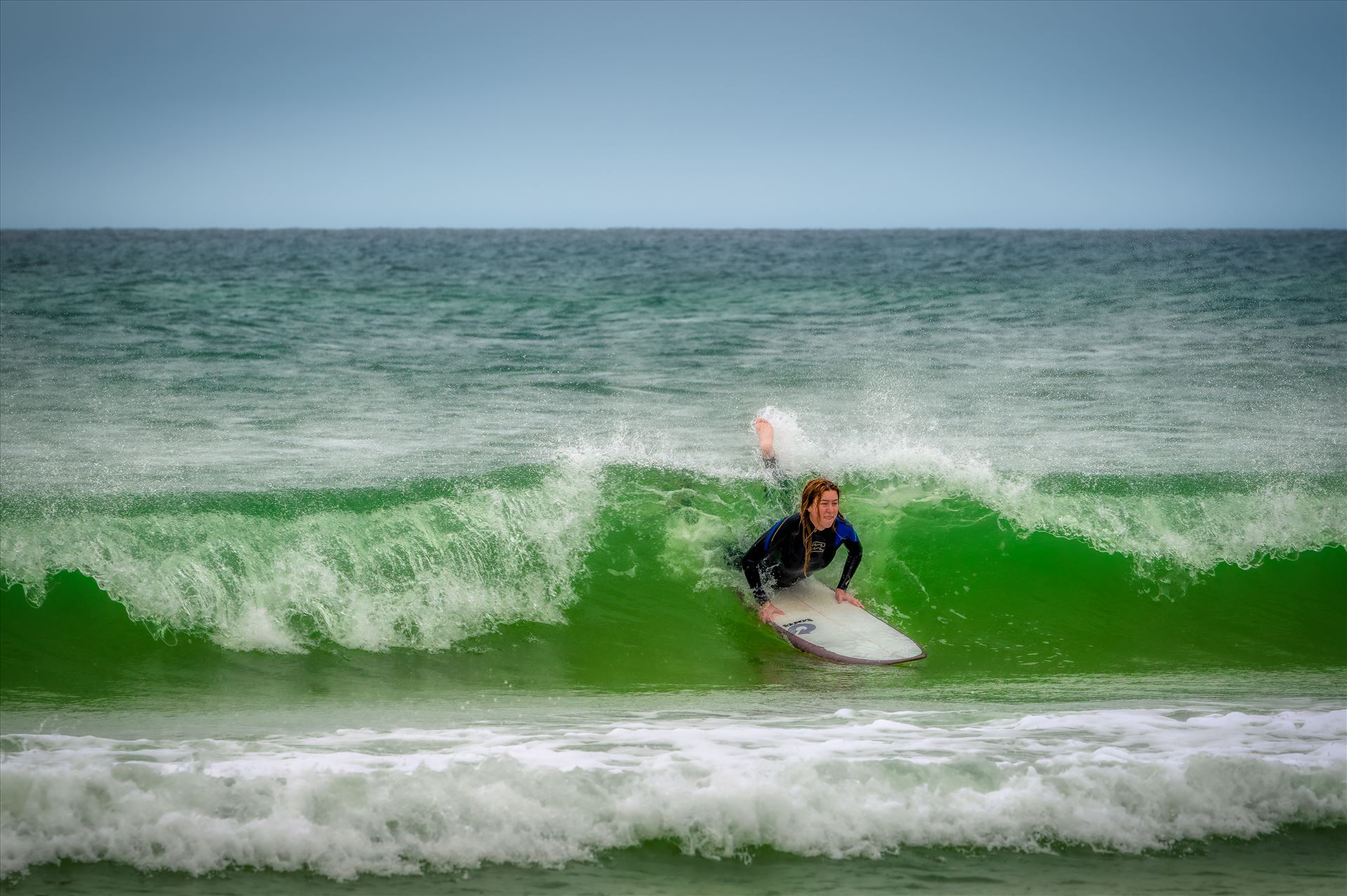 surfer girl - Female surfer at St. Andrews State Park at the jetties by Terry Kelly Photography