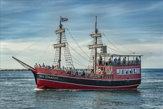 The Sea Dragon pirate ship coming from the gulf of mexico through the jetties at Panama City, Florida