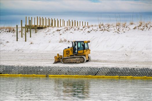 Beach renourishment Destin Florida bulldozer white sand